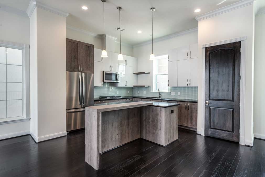  This townhome kitchen showcases a unique island design. 