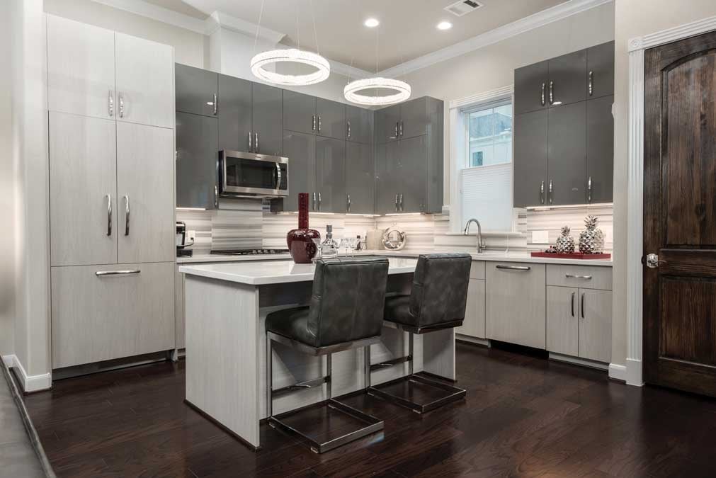 Integrated appliances are an optional upgrade and complement this kitchen's interior design package. 