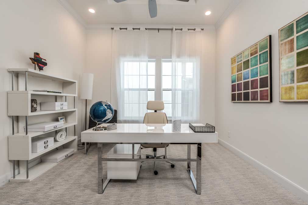 A secondary bedroom provides the perfect space for a home office.  